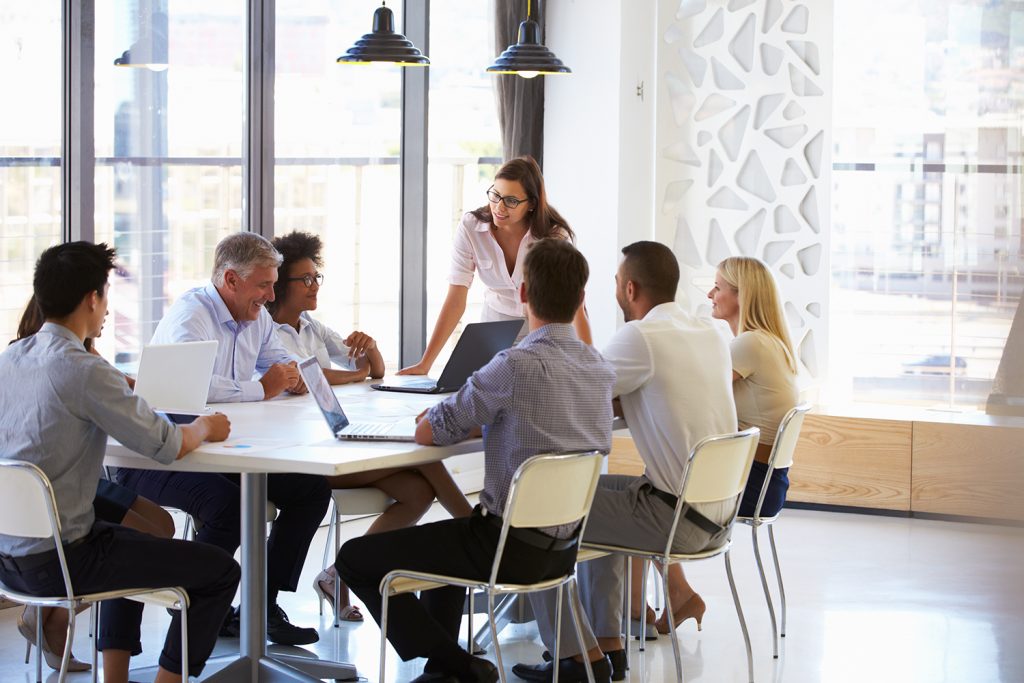 group of employees in conference room